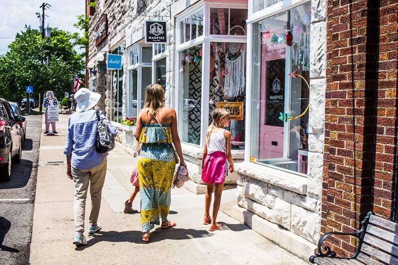 family walking up to MAgpies store in Downtown Franklin Tn