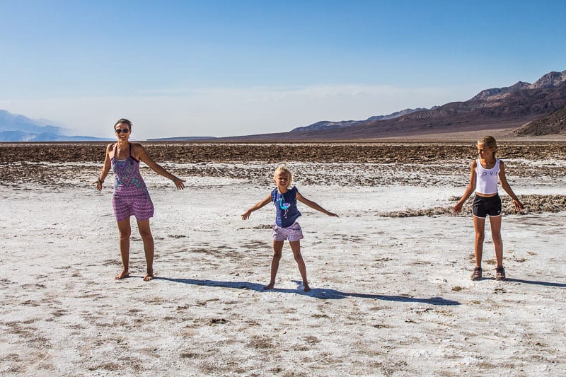 girls standing on salt flats Death Valley National Park California