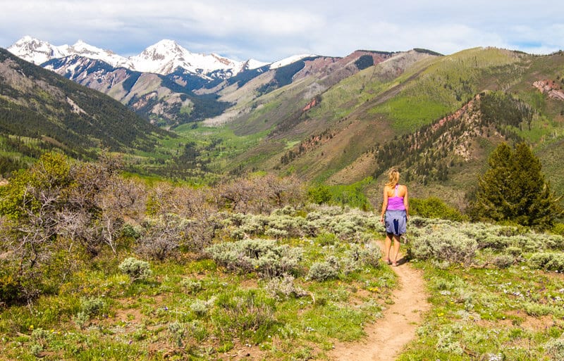 woman standing on mountains