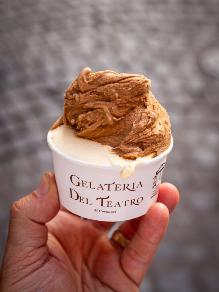 person holding cup of gelato