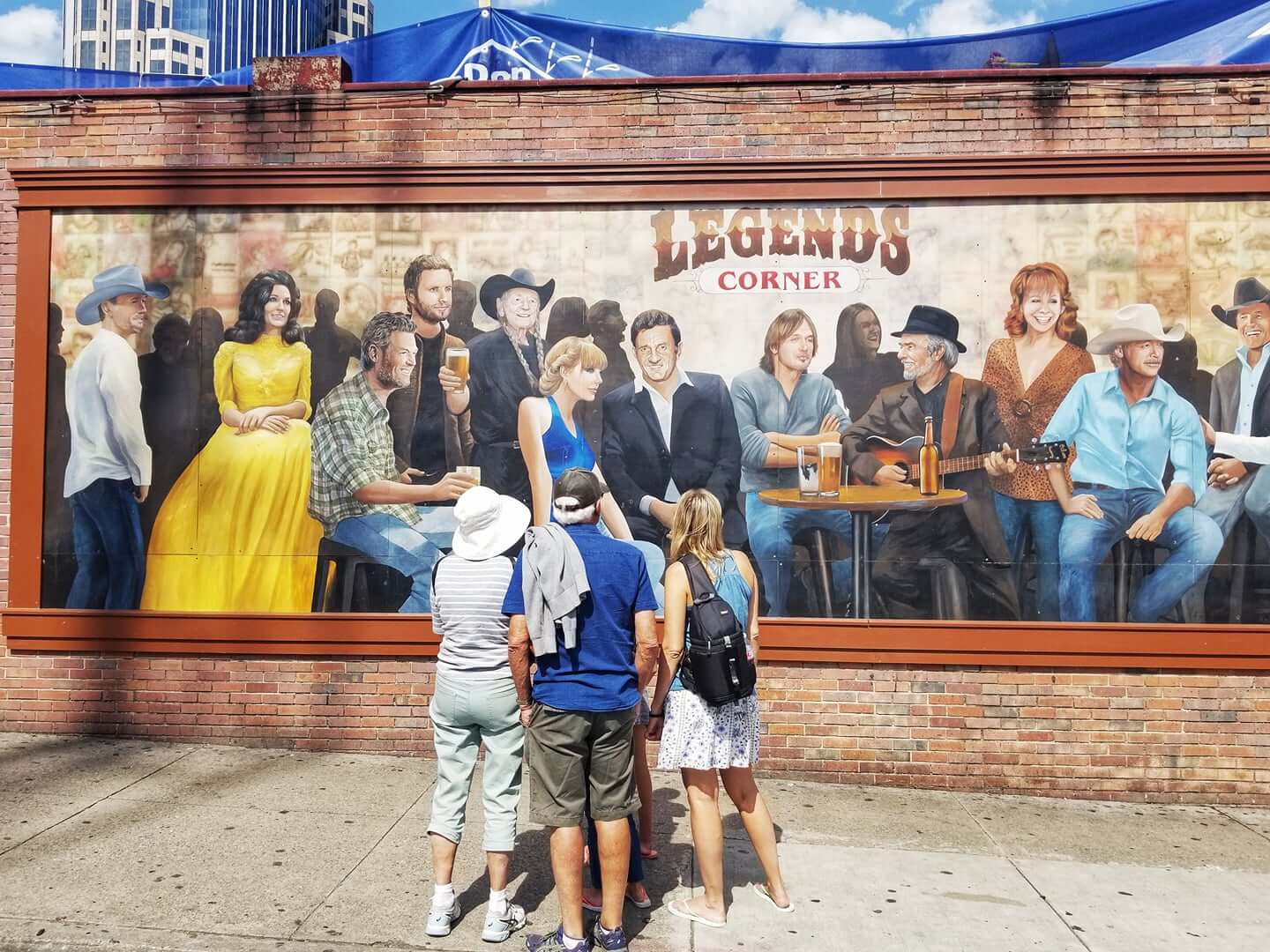 family looking at nashville mural