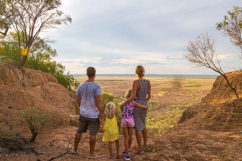 Family looking out at desert view in outback queensland