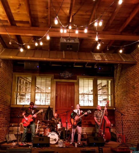 band on stage at the A.M Booth Lumberyard Huntsville Alabama (6)