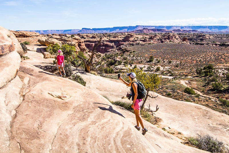 people walking up rocks