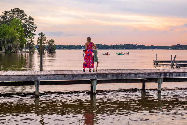 people standing on a dock