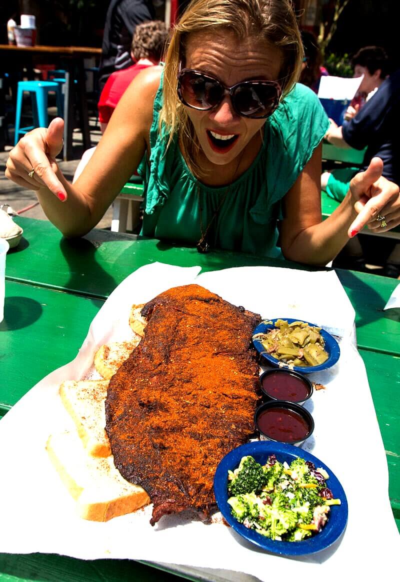 woman looking at a plate of food