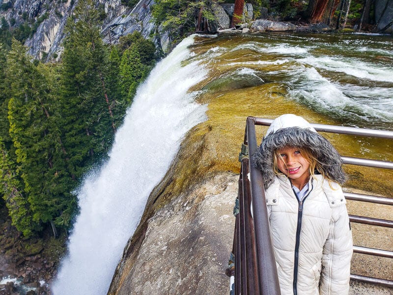 girl posing at the top of vernal falls